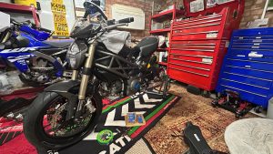 Ducati motorcycle carefully stored and protected indoors